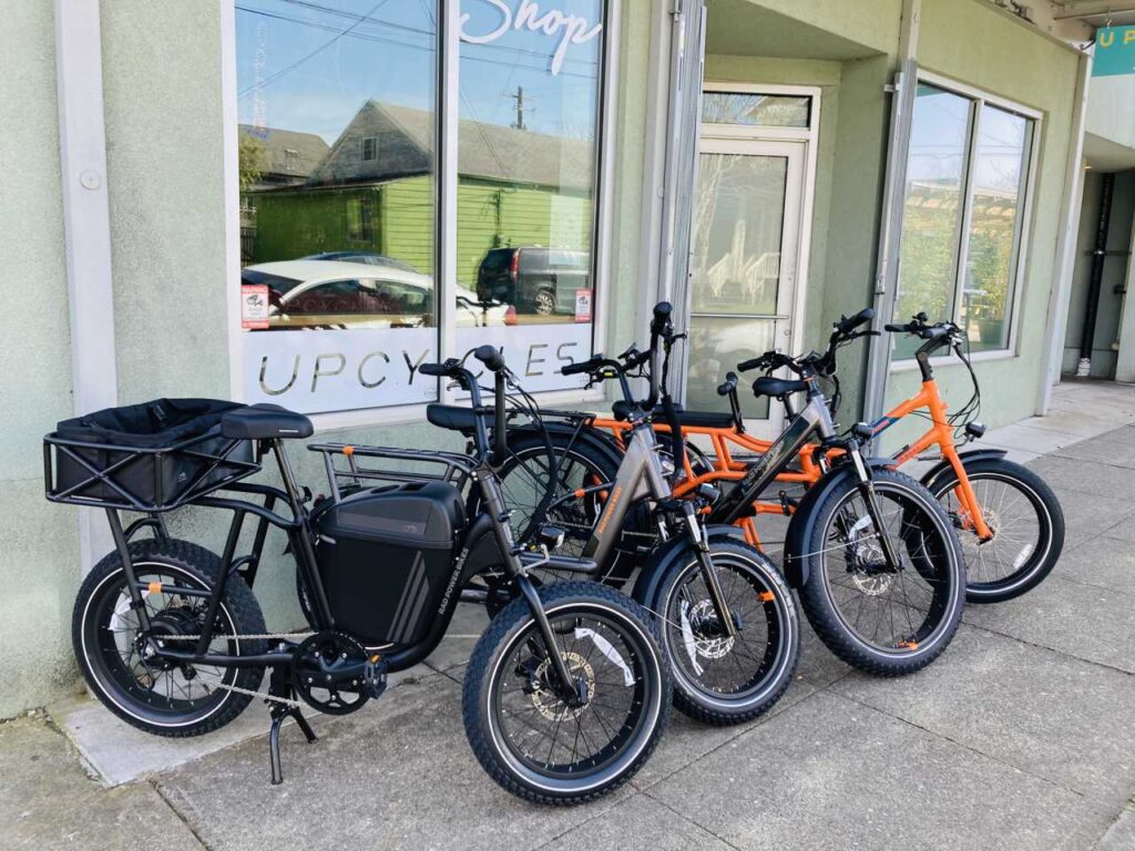 Upcycles storefront with Rad Power demo bikes